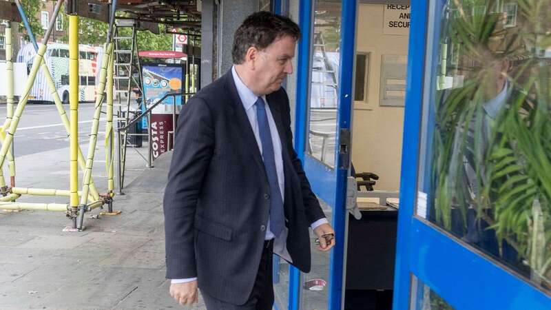 Work and Pensions Secretary Mel Stride entering a job centre to give a speech (Image: Ian Vogler / Daily Mirror)