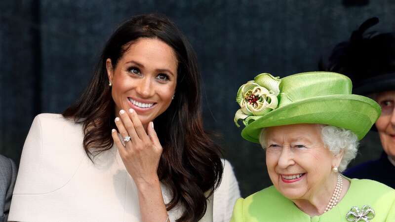 Meghan Markle with the late Queen (Image: Getty Images)