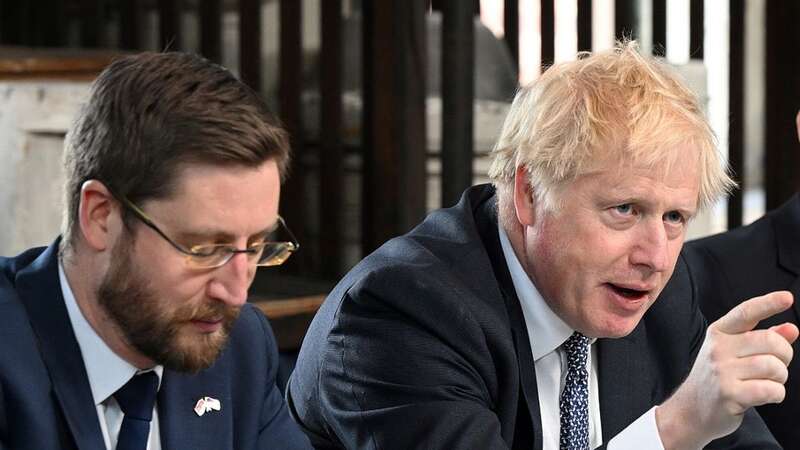 Simon Case (left) slated Boris Johnson