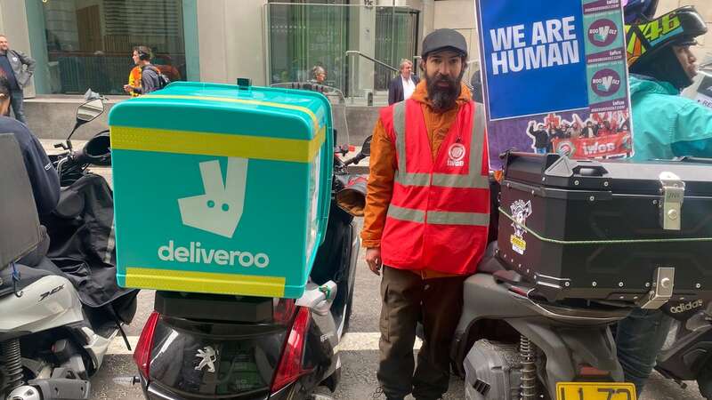 Celestino Pereira, who has worked as a driver for five years after moving to London from Brazil, with other Deliveroo drivers during a demonstration in London (Image: 2024 PA Media, All Rights Reserved)