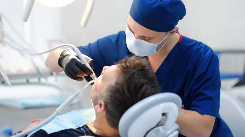 There are certain signs if gum disease (Image: Getty Images)