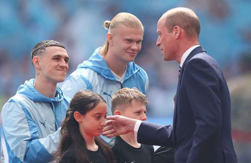 Wills seemed to be giving tips on the action to Prince George