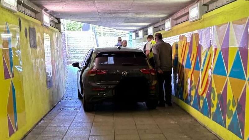 The car got stuck in a subway (Image: Liverpool Echo)