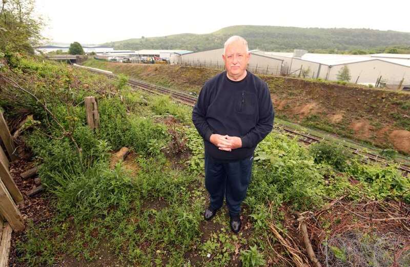 Householders in 14 terraced houses have signed a petition calling for workers to stay out of their gardens