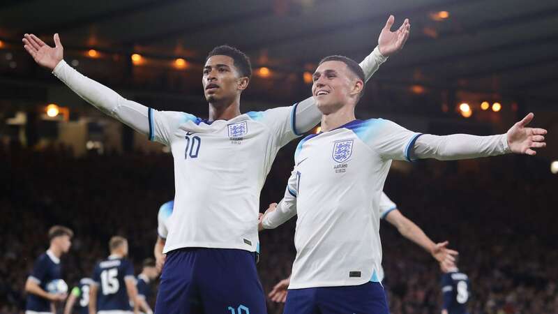 GLASGOW, SCOTLAND - SEPTEMBER 12: Jude Bellingham of England celebrates with Phil Foden after scoring his side