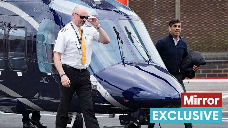 Rishi Sunak arriving back in London on a private helicopter - just hours after gushing about train travel (Image: BACKGRID)