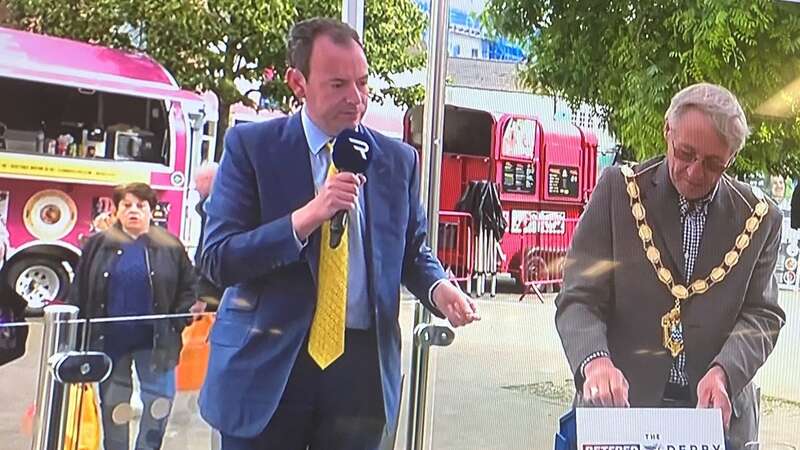 Nick Luck (left) hosting the live Derby draw in Epsom town centre