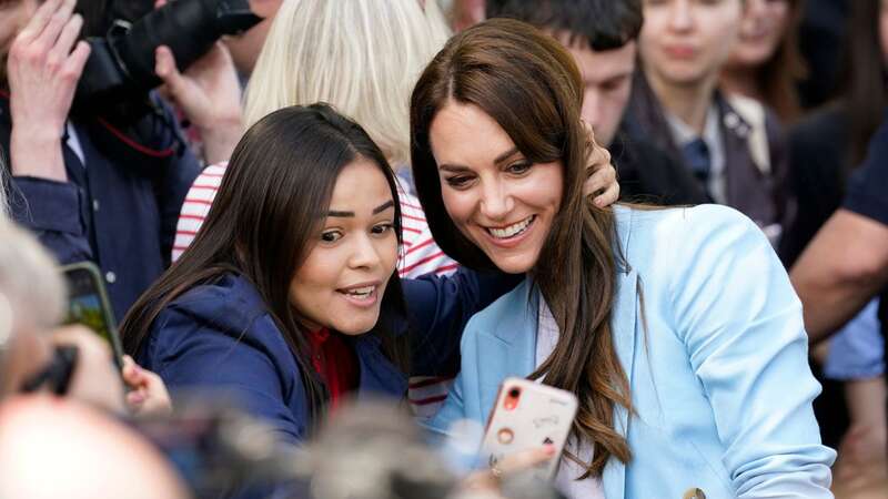 Catherine poses for a selfie during a walkabout on the Long Walk near Windsor Castle (Image: AP)