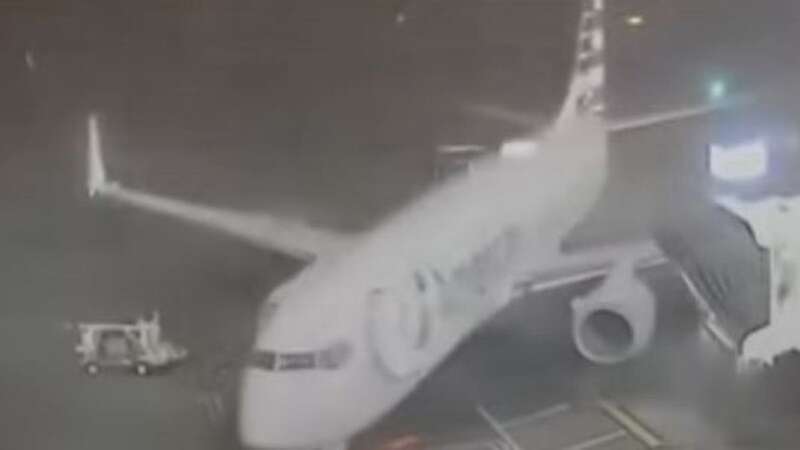 Terrifying moment plane pushed across tarmac by strong winds at airport