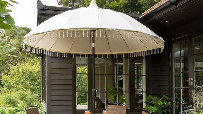 Recycled Polyester Cream Carousel Parasol from Dunelm (Image: Dunelm)