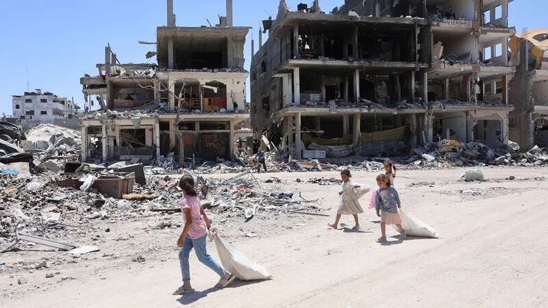 Palestinians walking through the Jabalia refugee camp in northern Gaza (Image: AFP via Getty Images)