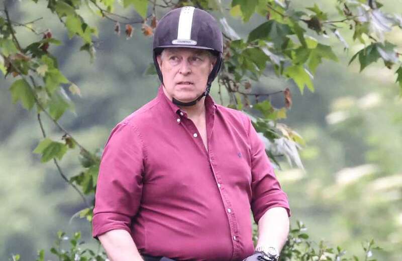 The Duke of York appeared tense as he paused for a break from exercising his horses