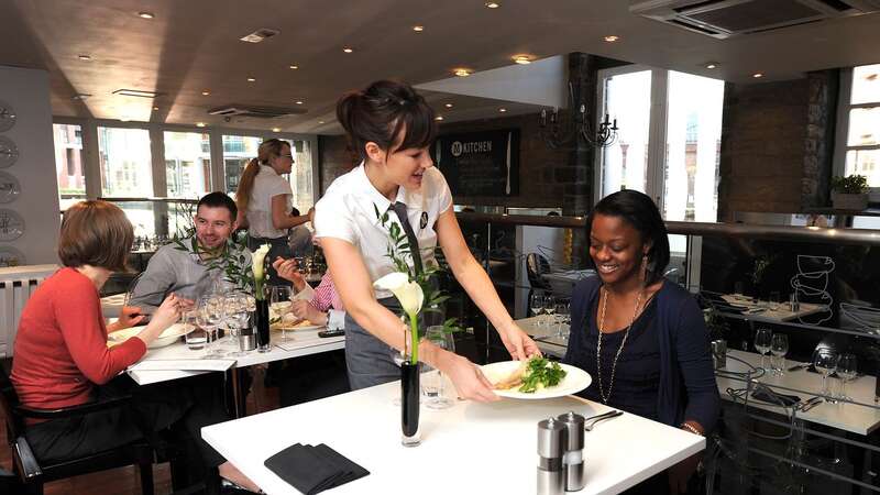 Service sector firms saw growth slow in May as inflation pressures eased (Image: PA Archive/PA Images)