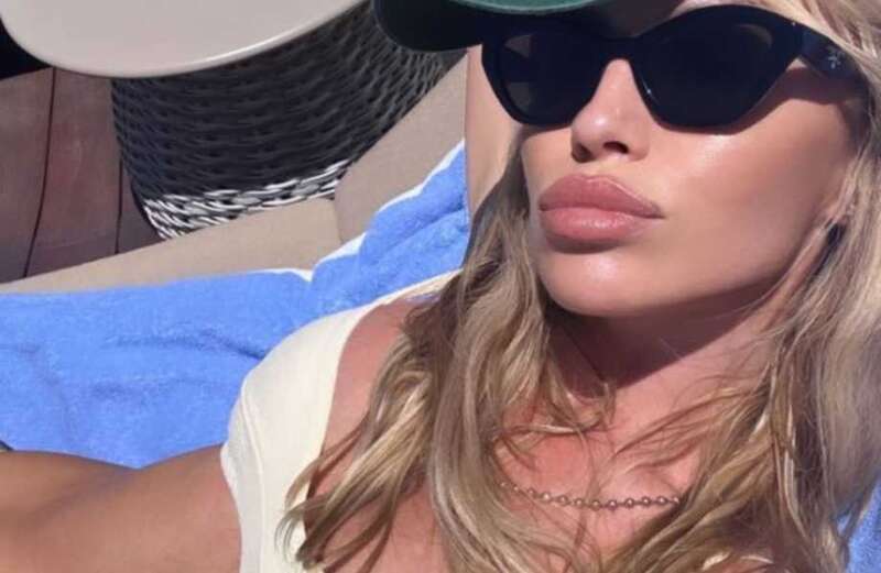 Abbey Clancy flashes her bum in thong bikini as Peter Crouch takes holiday snaps