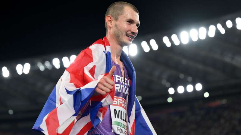 George Mills celebrates winning silver at the European Championships.