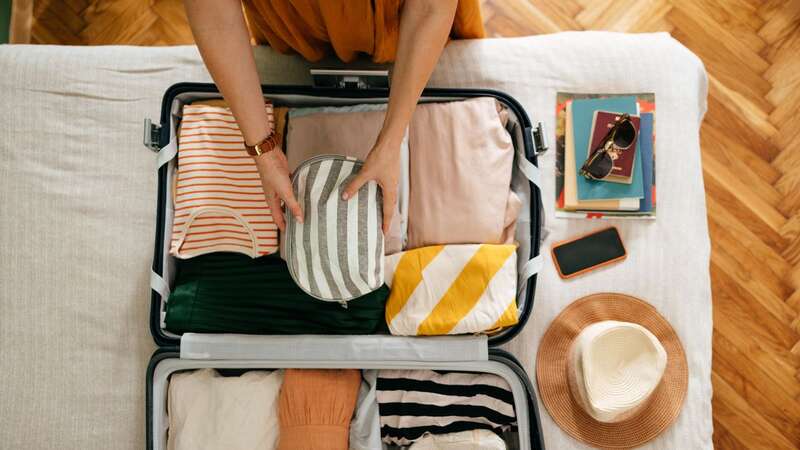 One shopper managed to fit four full winter outfits inside plus toiletries (Image: Getty)