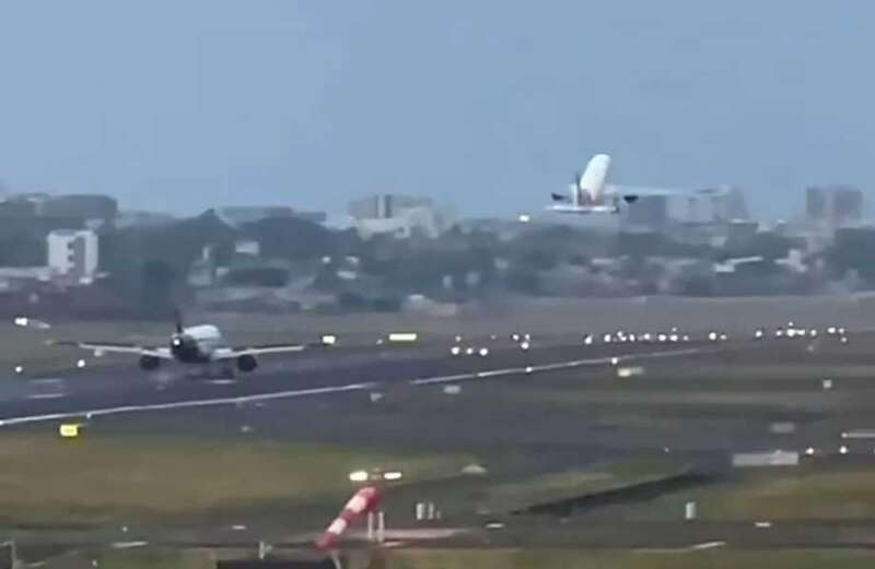 Terrifying footage above captures the Air India plane taking off within seconds of the IndiGo plane landing