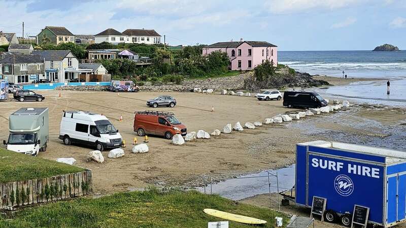 Polzeath Beach in Cornwall has introduced new measures to its car park after being plagued by wild parties (Image: Andy Stewart/SWNS)