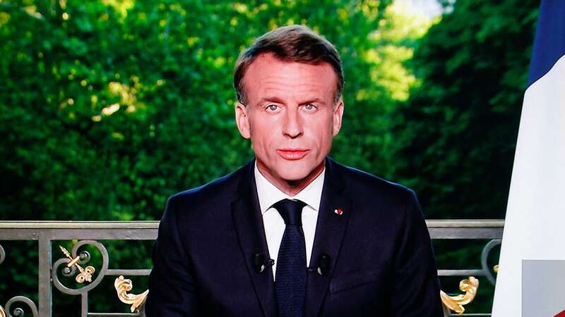 French President Emmanuel Macron speaks during a televised address to announce he is dissolving the National Assembly (Image: AFP via Getty Images)