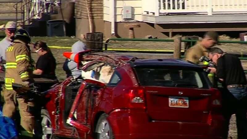 The car after being lifted out of the freezing river (Image: CBS)