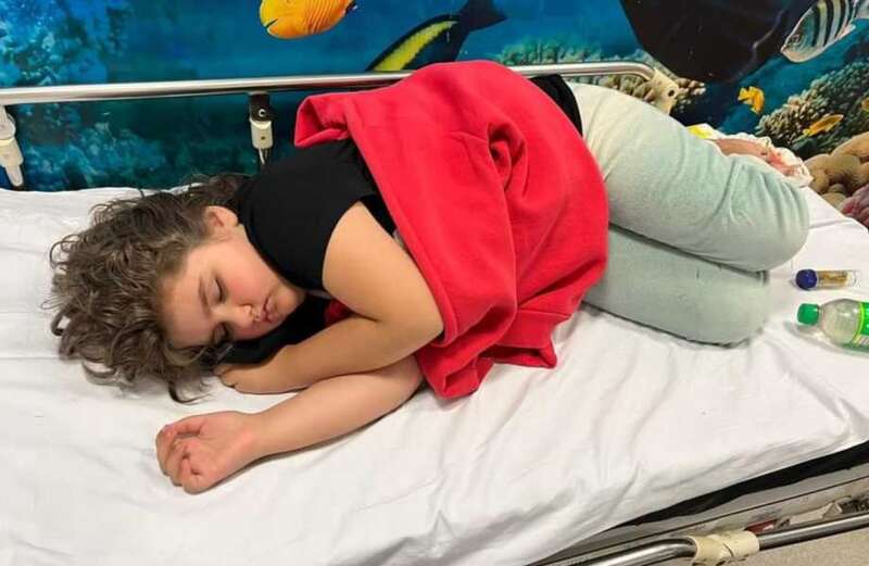 Heartbreaking photos show the kids unwell after their "once-in-a-lifetime" getaway