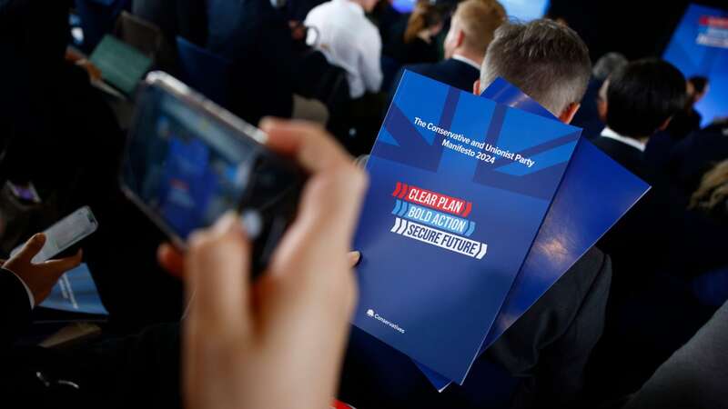 Rishi Sunak has been criticised for the blue Union Flag on the cover of the Tory manifesto (Image: Getty Images)