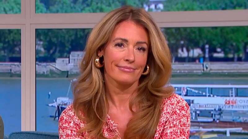 Cat Deeley stepped out onto the This Morning sofa wearing a red and white boucle trophy jacket (Image: ITV)