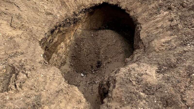 The sinkhole was discovered on a busy beach (Image: HM Coastguard Southend/SWNS)