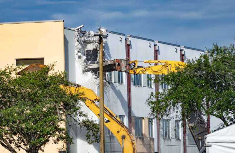 Exclusive drone footage shows the demolition of the building where 17 died