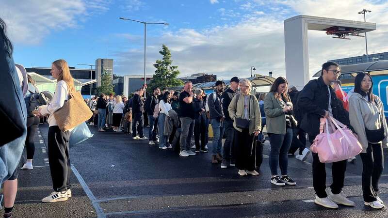 Airline passengers faced huge queues at Birmingham airport, UK, this morning (Image: SWNS)