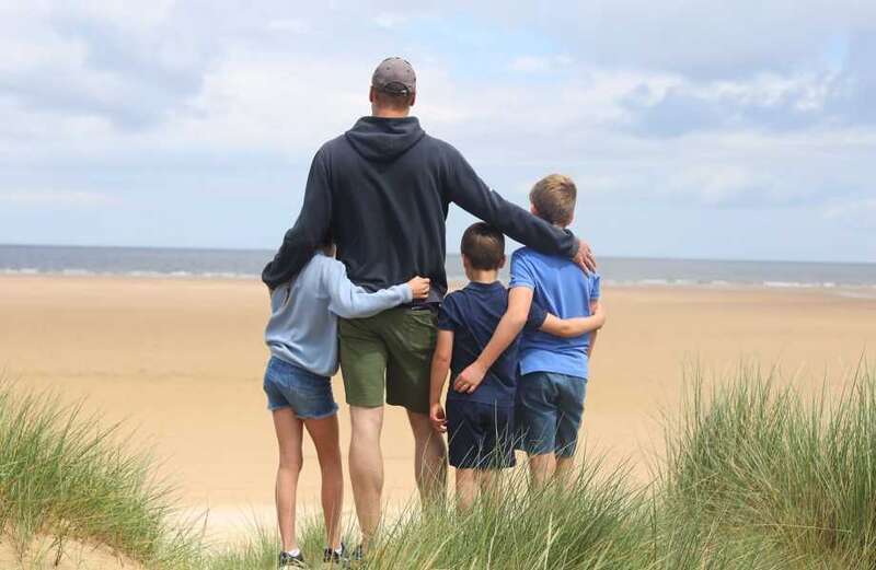 I admire Katherine’s willingness to share her family photos and it’s lovely to see informal pics of the kids in beach clothes