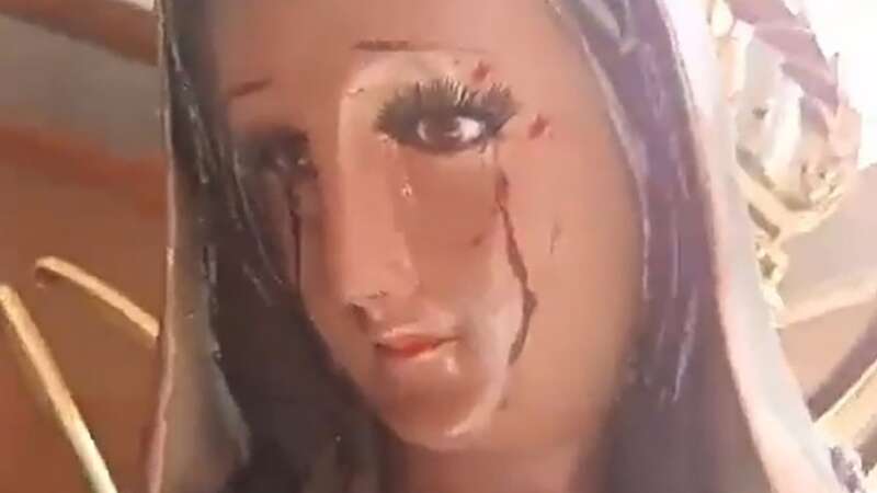 The statue of the Virgin Mary with alleged tears of blood (Image: Newsflash)