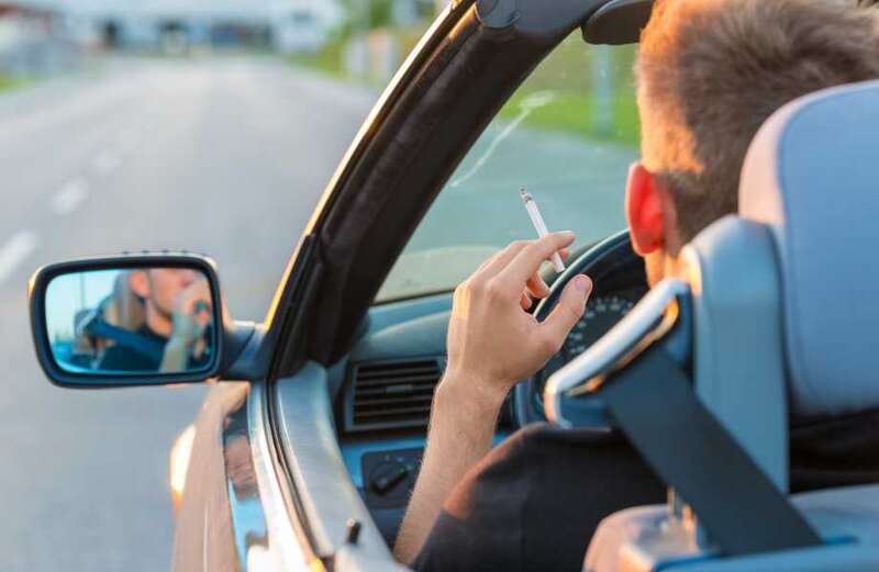 Find out if you can get fined for smoking in a car