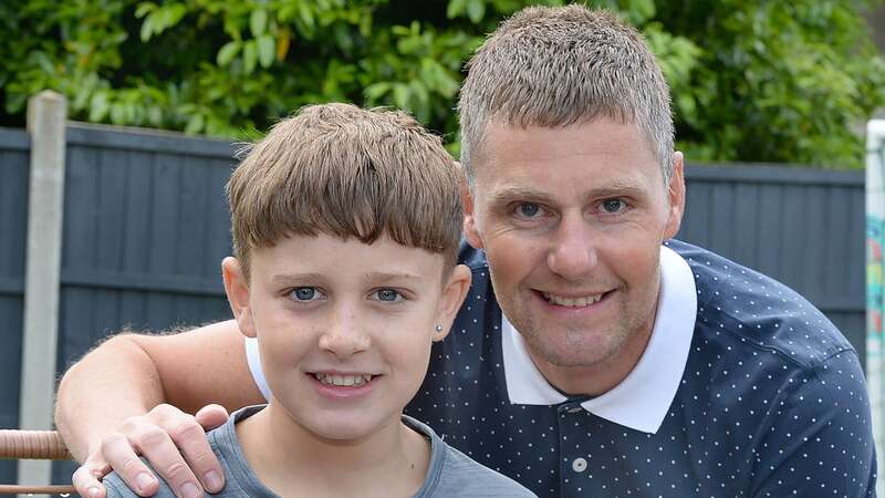 Little hero Freddie Newton with his dad Matt (Image: Rotherham Advertiser/SWNS)