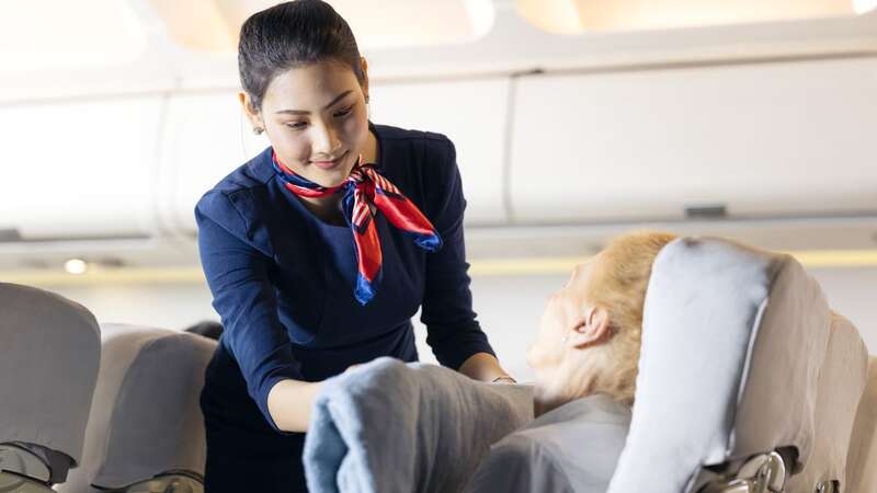 A flight attendant has warned passengers not to make one common mistake. (Image: Getty Imafes/iStockphoto)