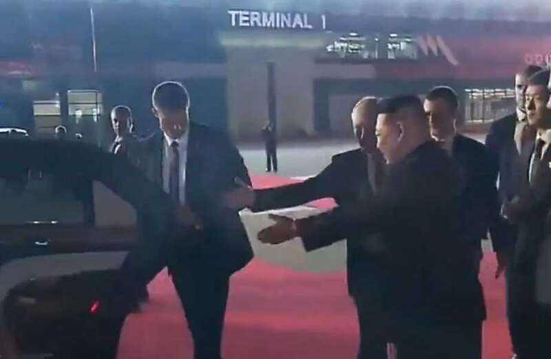 Watch the awkward moment Putin and Kim try to usher each other into a limo