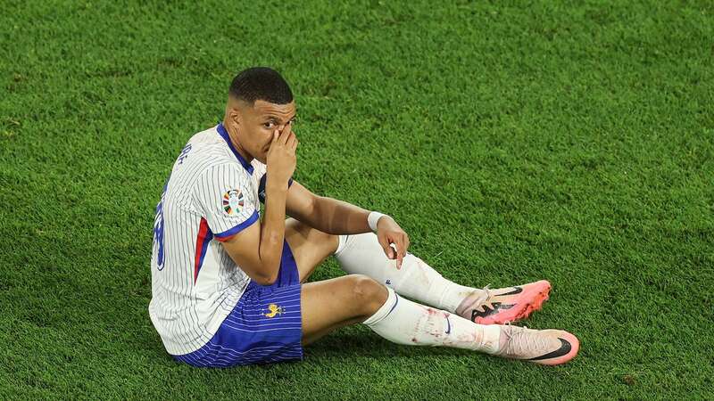 Kylian Mbappe of France holds his nose after receiving medical treatment (Image: 2024 Getty Images)