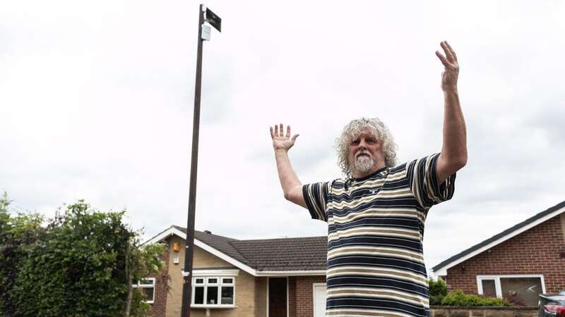 Philip Waller, 65, returned from a shopping trip to find a huge pole outside his house (Image: SWNS)