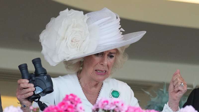 Queen Camilla looked rather disappointed by the race (Image: James Whatling)