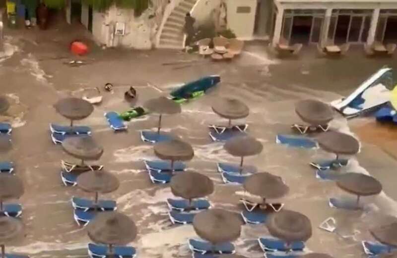 Footage caught the moment tourists grabbed their belongings and dashed to safety as the waves rolled in