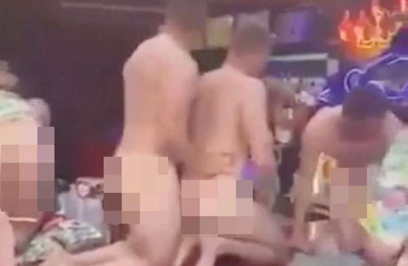 Watch as the drunken tourists mount the bar completely naked