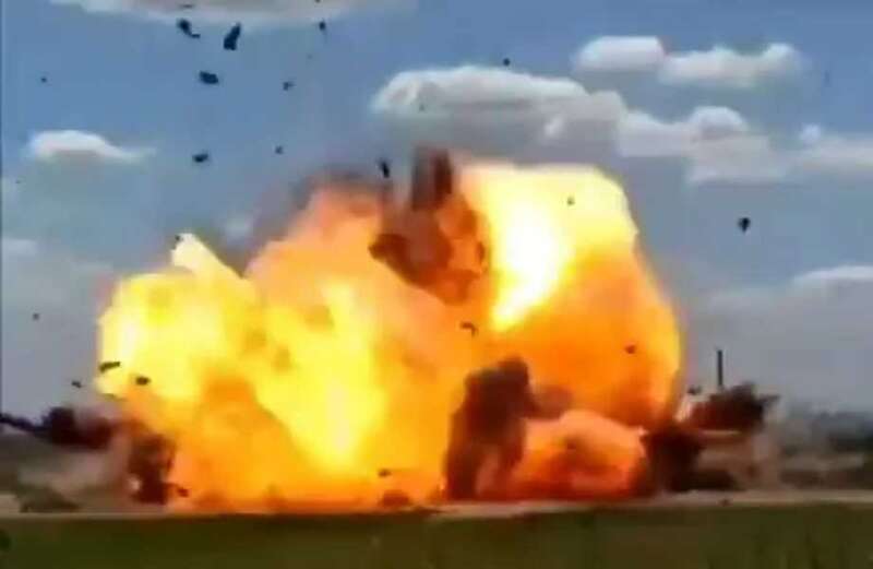 Footage of the fiery explosion shows shrapnel flying miles in the air