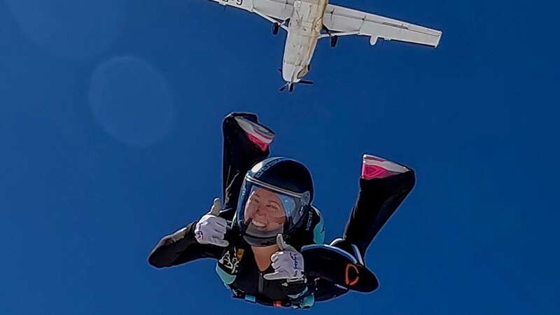 Professional skydiver Laura Hampton, 38, after exiting a plane (Image: Peter Harries/SWNS)