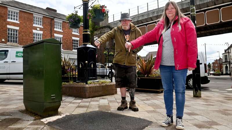 Shifnal residents Jackie and David Wenlock who were some of those unimpressed at the state of the pavement (Image: Shropshire Star/SWNS)