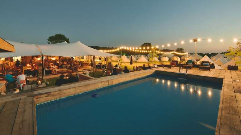 The Pop-Up Hotel at Glastonbury offers the use of a swimming pool to its guests (Image: The Pop-Up Hotel)