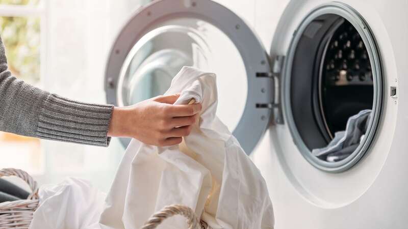 The average person spends three hours on laundry every week (Image: Getty Images)