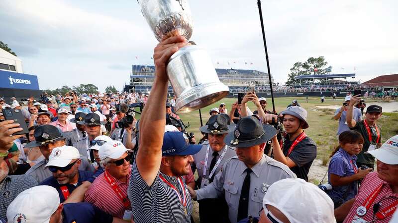 Bryson DeChambeau has celebrated his U.S. Open title by letting fans touch the trophy (Image: Getty Images)