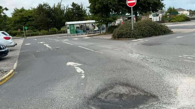 Supermarket giant Morrisons has promised to fix a giant pothole in their carpark - as shoppers say it looks like a "meteor strike". (Image: Raymond_HughesWALES NEWS SERVICE)