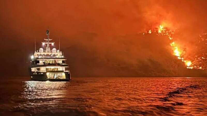 A Greek mayor blamed passengers on a yacht for the fire (Image: Facebook/epoxikoipirosvestes)