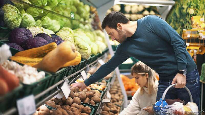 Customers shop for vegetables in a supermarket (file image) (Image: Getty Images)